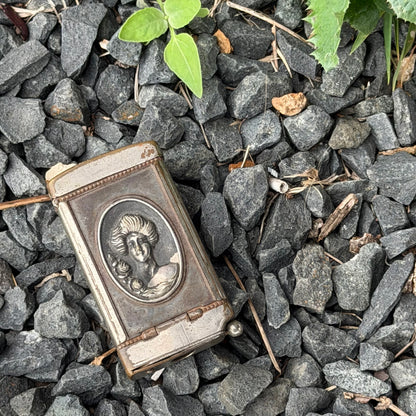 Antique Buck/Woman Match Holder and Striker